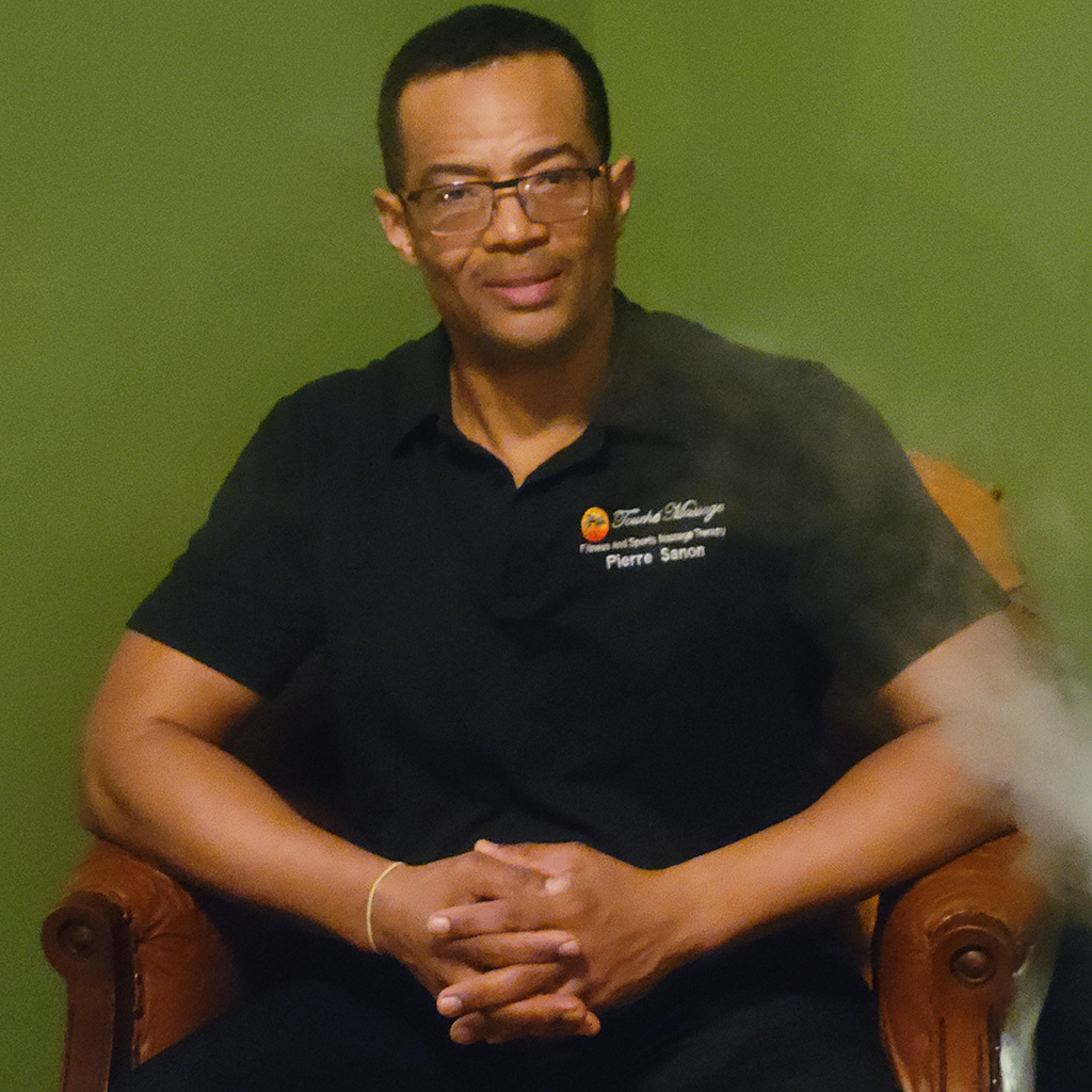 A licensed massage therapist Pierre Sanon.